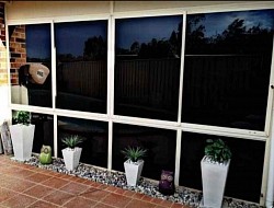 Enclosed alfresco windows and doors tinted privacy glass window Coverings energy efficient glass home window Tinting Sydney