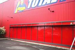 Total tools commercial buisness commercial glass window signage red vynil install Window Tinting and Frosting sydney