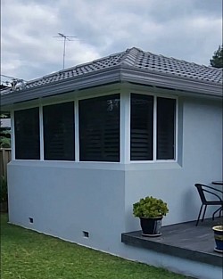 TMC Tinting residential window tinting Sydney — reflective solar film on brick home windows