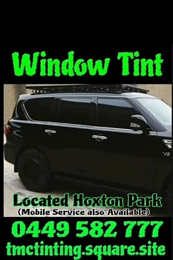 TMC Tinting automotive window tinting Sydney — ceramic tint installed on black toyota landcruiser  SUV Prestons workshop