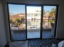 TMC Tinting home window tinting Sydney — ceramic film on sliding doors view from interior